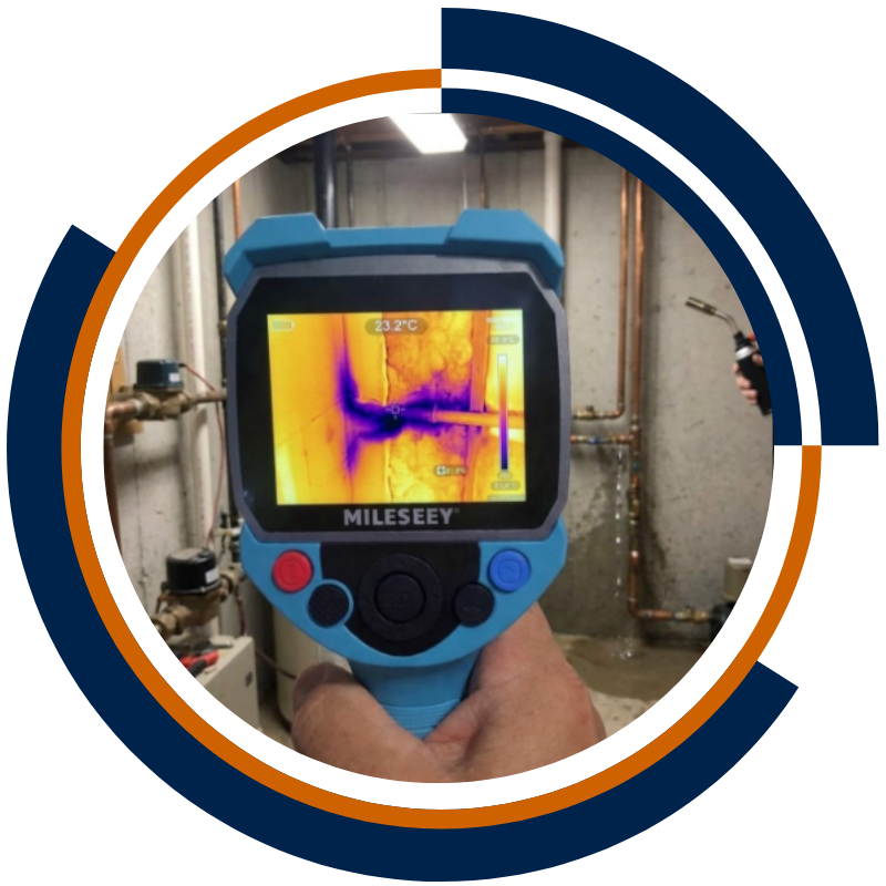 Thermal camera detecting hidden pipe leak and wall moisture in a Sydney property